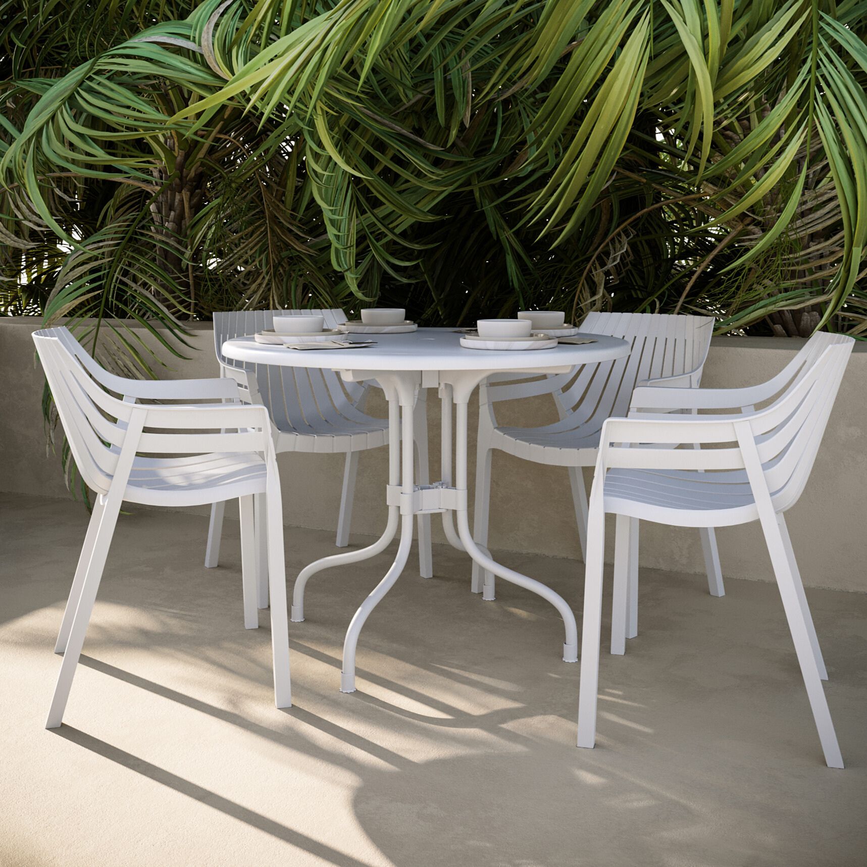 Four person outdoor round white dining table